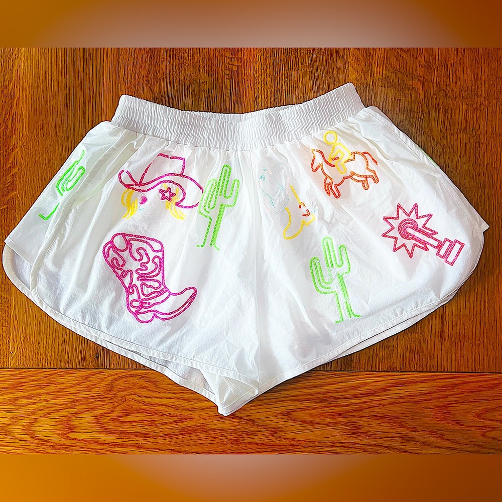 QUEEN OF SPARKLES RANCH ROMANCE WESTERN ICON NEON SEQUINED SHORTS IN WHITE XS